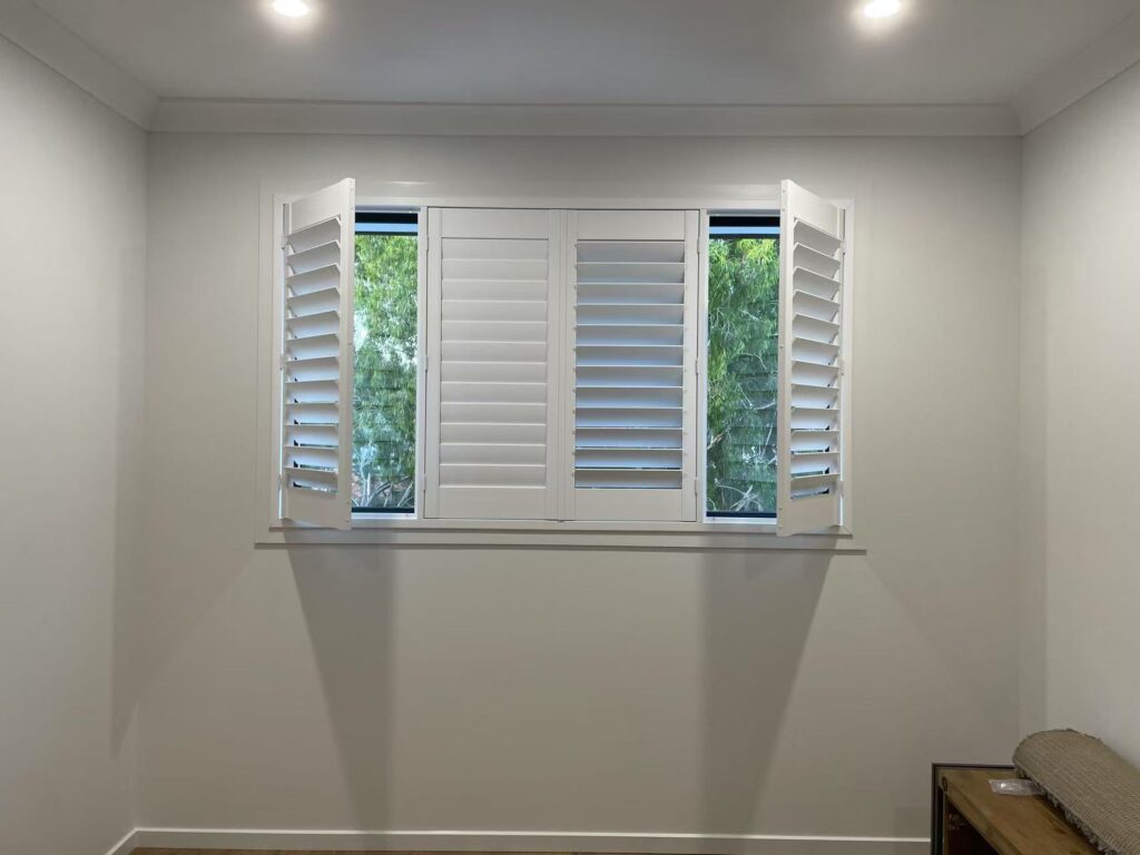 4 pvc plantation shutters installed in one window