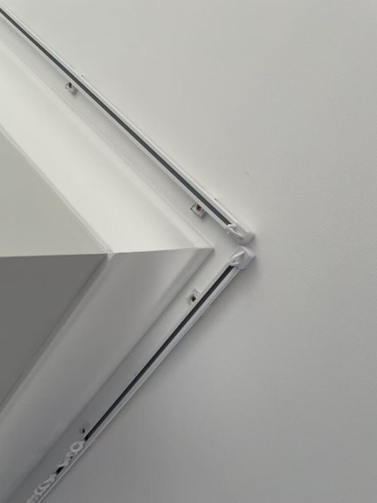 ceiling mount single track installed on a corner