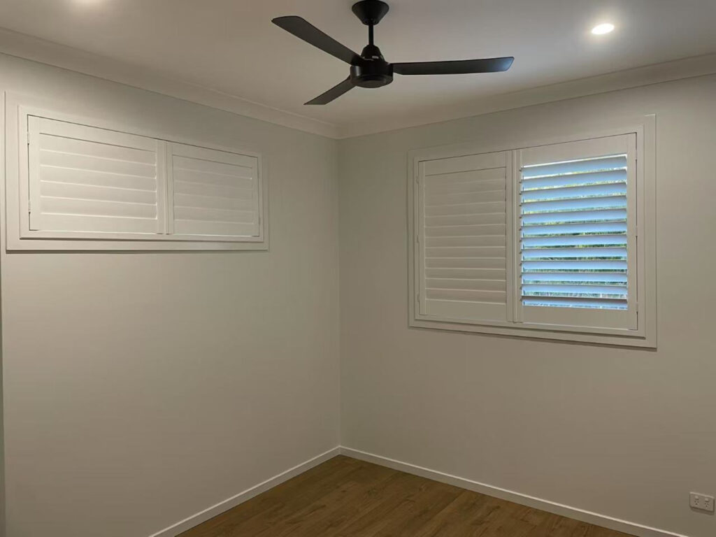 each window has 2 pvc plantation shutters installed in the bedroom
