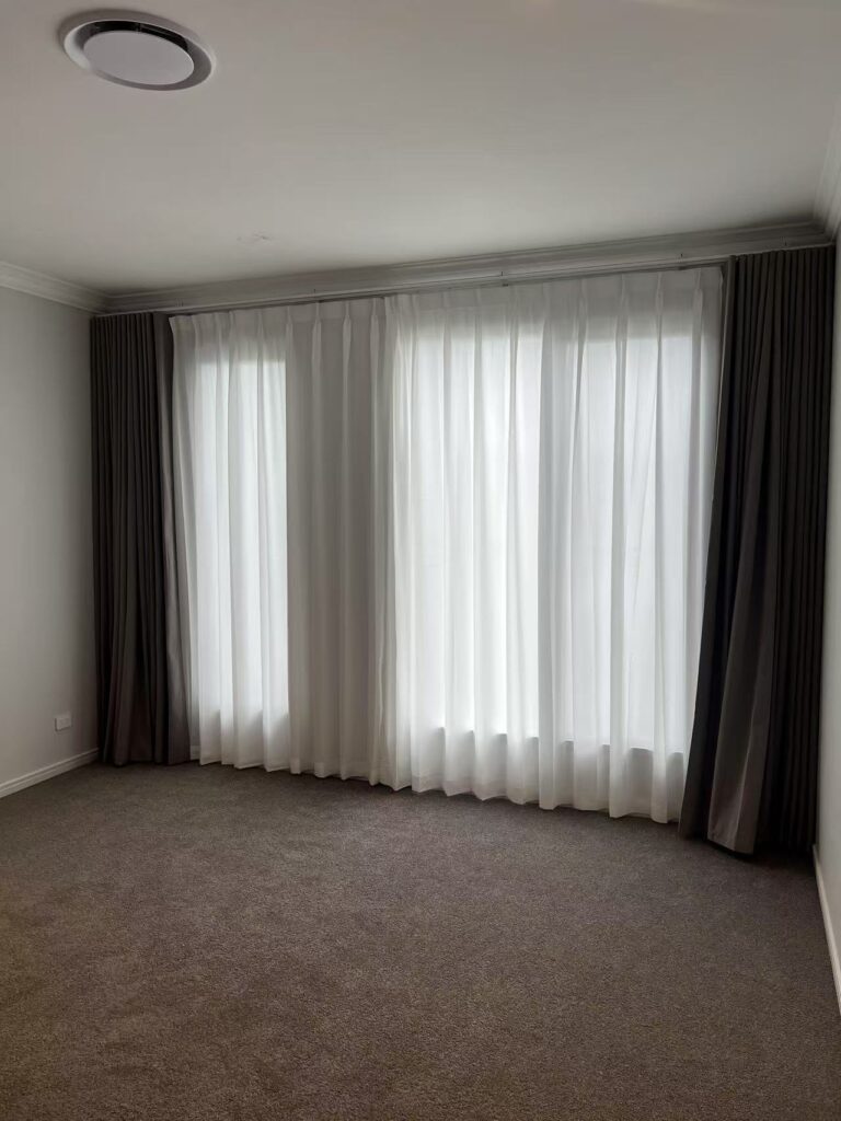 s fold blockout curtain with pinch sheer installed for bedroom windows