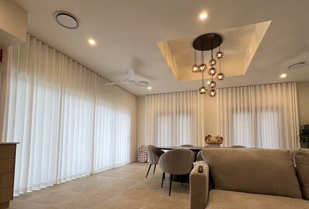 s fold privacy sheer installed for living and dining areas' windows