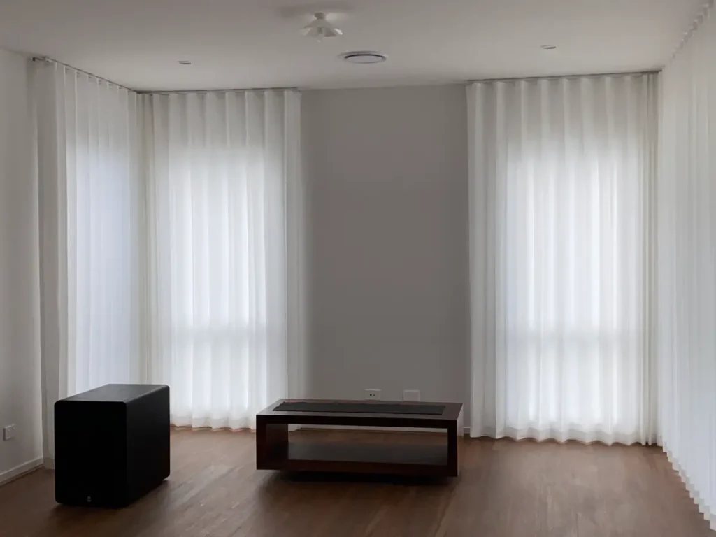 s fold privacy sheers installed for living area windows