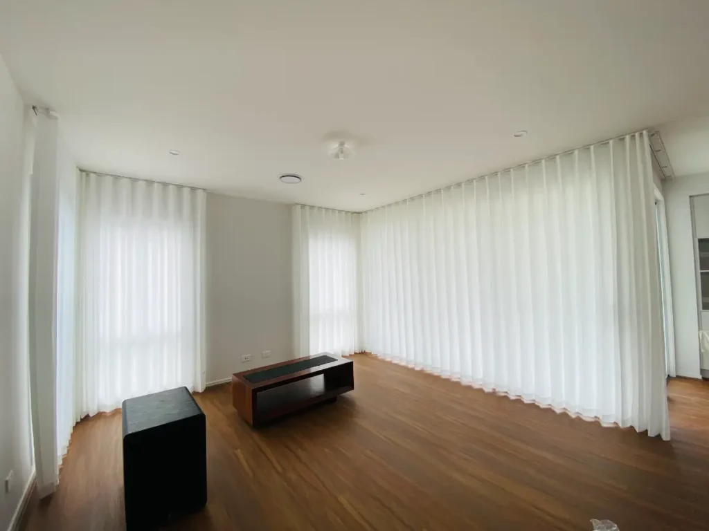 s fold privacy sheers installed for living area windows