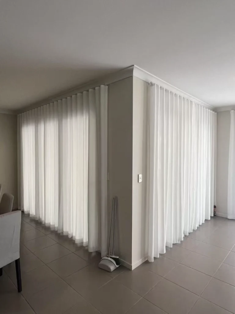 s fold privacy sheers installed for two sliding door in living