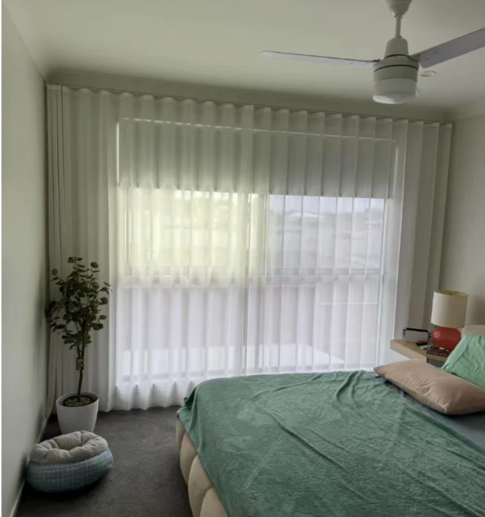 s fold transparent sheer with grey blockout curtain installed for bedroom window