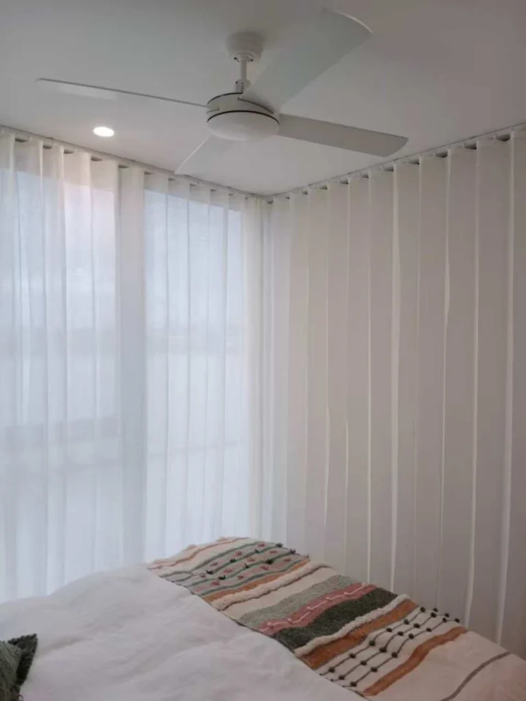 used curved truck to install s fold privacy sheer in bedroom