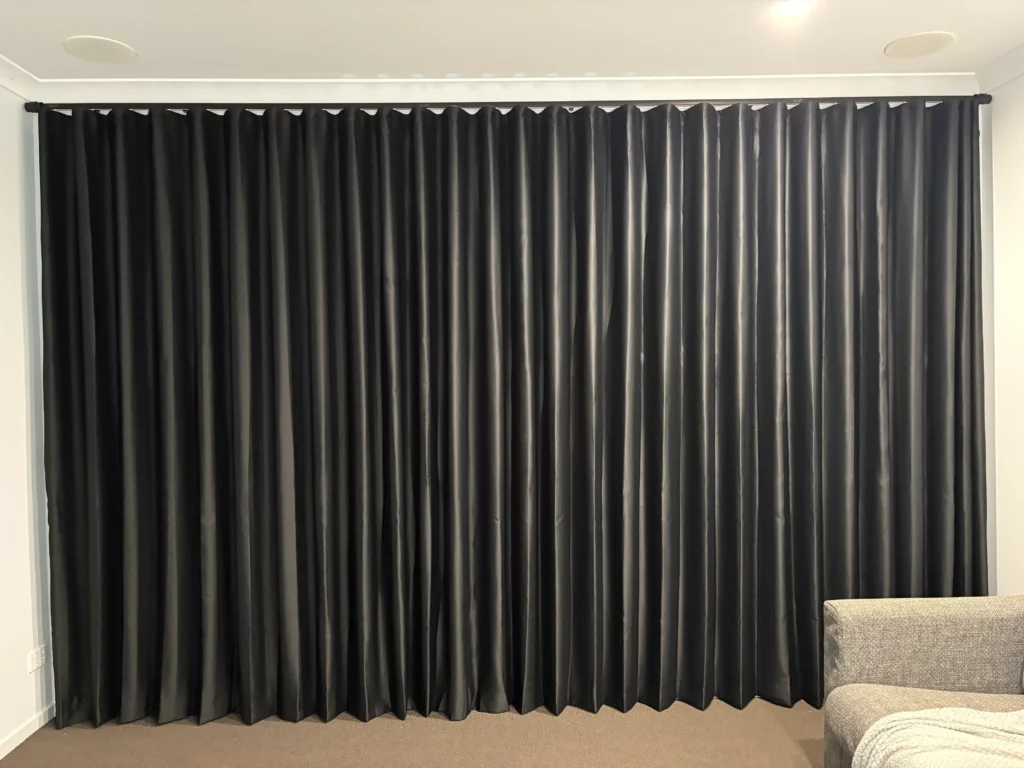 Black curtain in bedroom