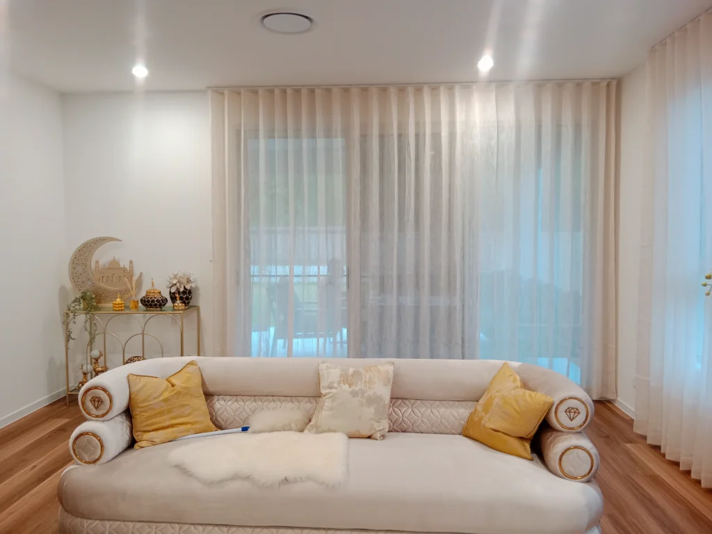 s fold transparent sheer installed for one large window in living room